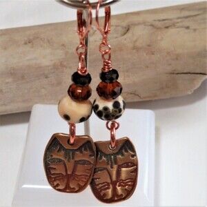 Leopard Face Earrings copper wirewrapped with leopard print lamp work beads OOAK